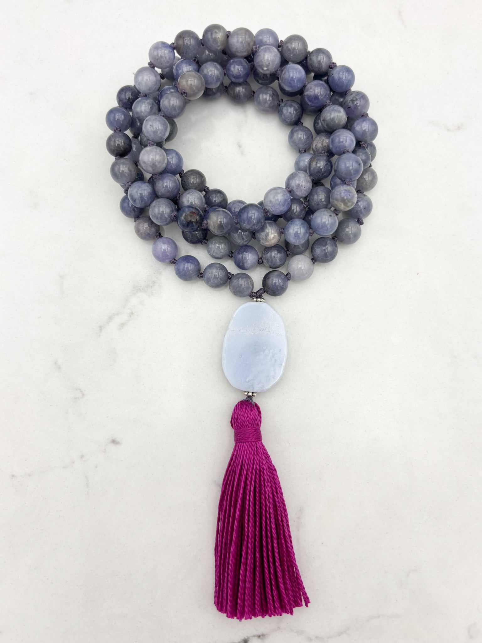 tanzanite gemstone mala necklace with blue lace agate guru bead and hot pink tassel | radiant malas | handmade in boulder, colorado