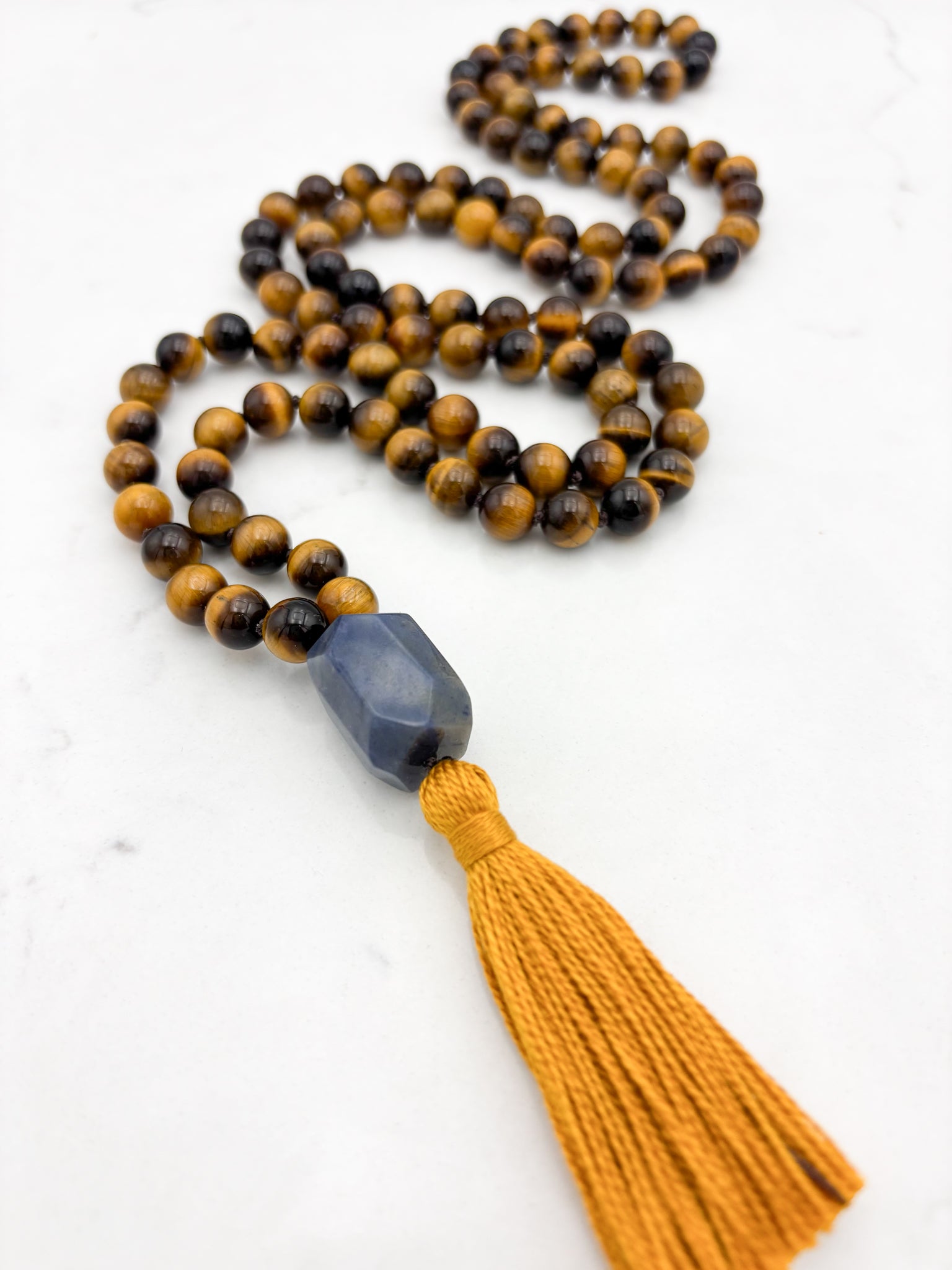 tiger's eye gemstone mala with blue quartz guru bead and gold tassel | radiant malas | handmade in boulder, colorado