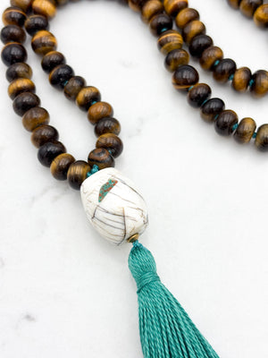 tiger's eye gemstone mala with bone guru bead and green tassel | radiant malas | handmade in boulder, colorado
