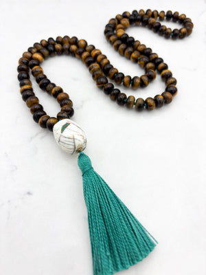 tiger's eye gemstone mala with bone guru bead and green tassel | radiant malas | handmade in boulder, colorado