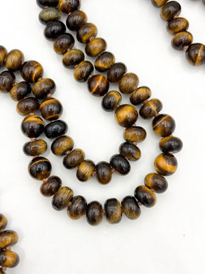tiger's eye gemstone mala with lapis guru bead and gold tassel | radiant malas | handmade in boulder, colorado
