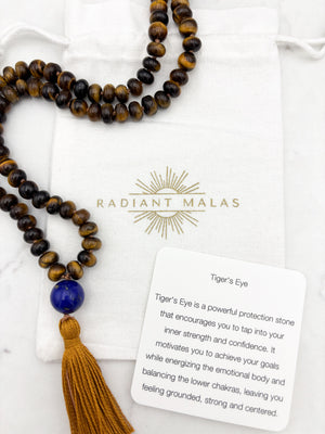 tiger's eye gemstone mala with lapis guru bead and gold tassel | radiant malas | handmade in boulder, colorado