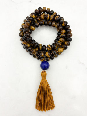 tiger's eye gemstone mala with lapis guru bead and gold tassel | radiant malas | handmade in boulder, colorado