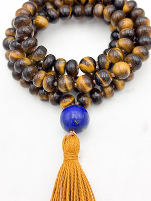 tiger's eye gemstone mala with lapis guru bead and gold tassel | radiant malas | handmade in boulder, colorado