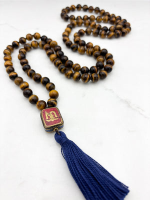 tiger's eye gemstone mala with vintage tibetan guru bead and navy tassel| radiant malas | handmade in boulder, colorado