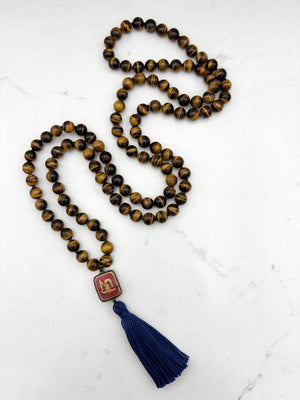 tiger's eye gemstone mala with vintage tibetan guru bead and navy tassel| radiant malas | handmade in boulder, colorado