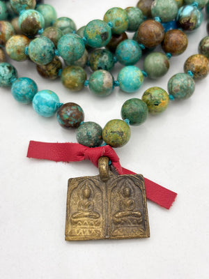 turquoise gemstone mala with brass double buddha pendant | radiant malas | handmade in boulder, colorado