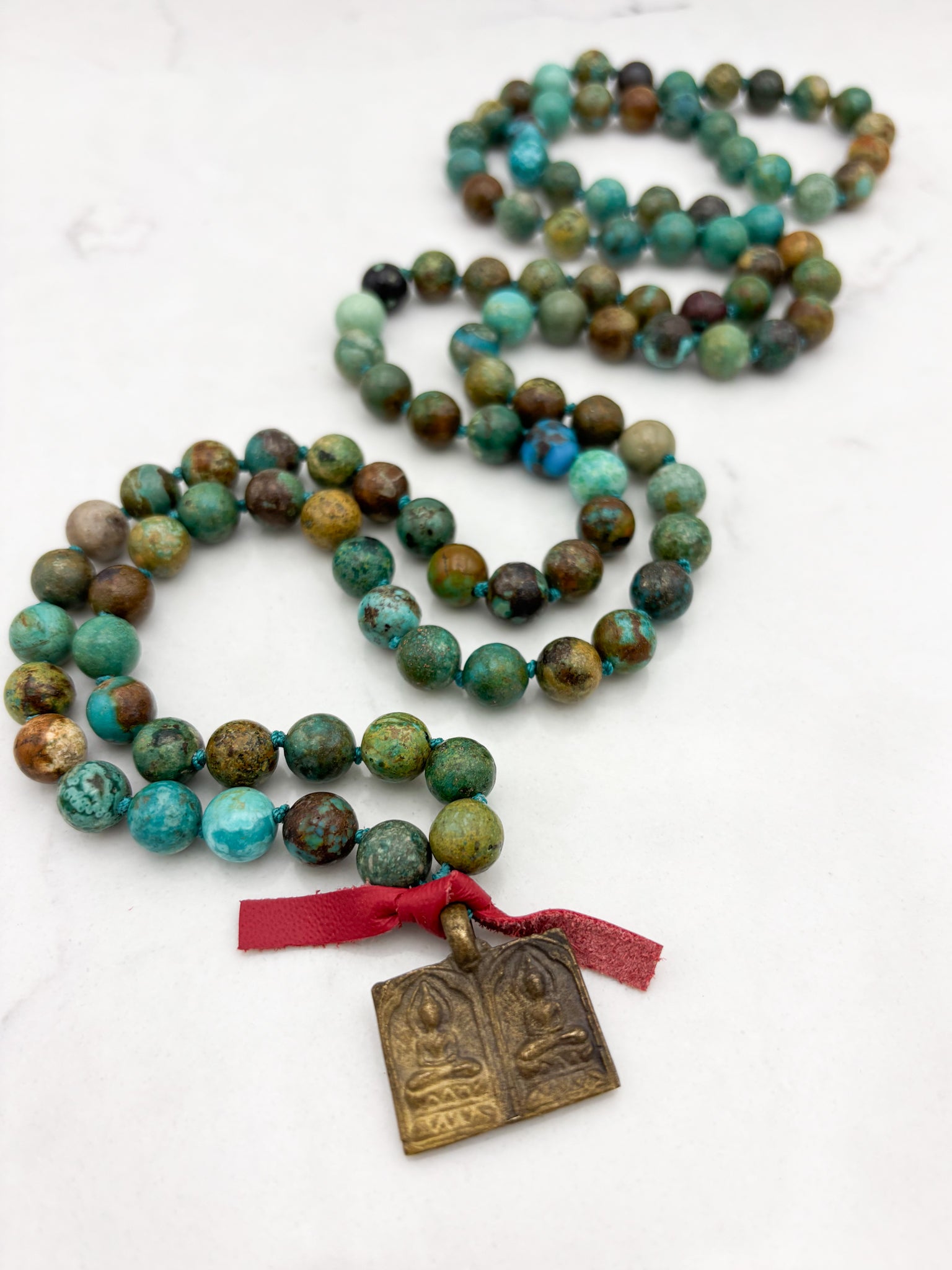turquoise gemstone mala with brass double buddha pendant | radiant malas | handmade in boulder, colorado
