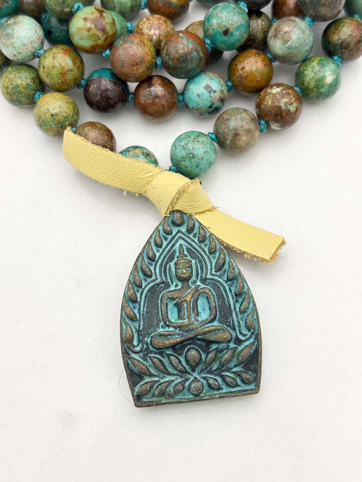 turquoise gemstone mala with brass buddha pendnat | radiant malas | handmade in boulder, colorado