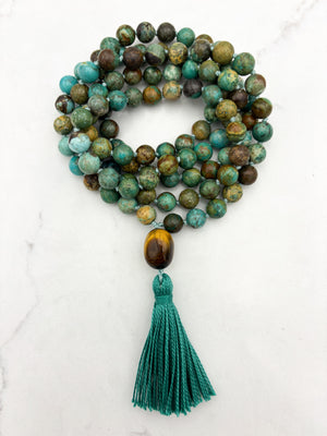 turquoise gemstone mala wiith tiger's eye guru bead and turquoise tassel | radiant malas | handmade in boulder, colorado