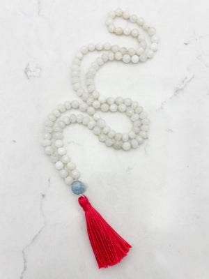 white jade gemstone mala necklace with aquamarine guru bead and pink tassel | radiant malas | handmade in boulder, colorado