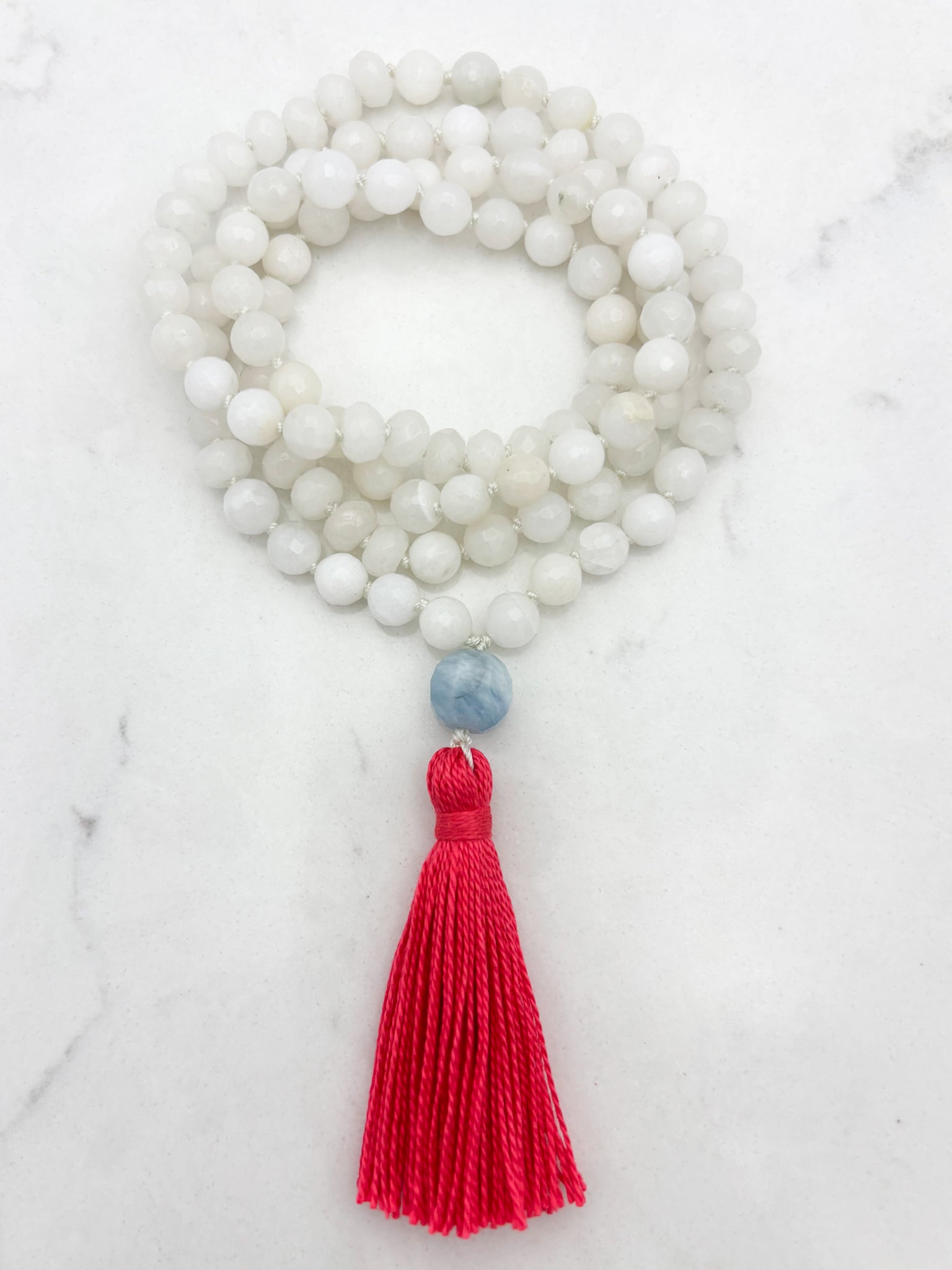 white jade gemstone mala necklace with aquamarine guru bead and pink tassel | radiant malas | handmade in boulder, colorado