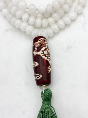 white jade gemstone mala necklace with wood/dragon guru bead and green tassel | radiant malas | handmade in boulder, colorado