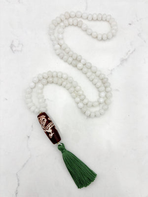 white jade gemstone mala necklace with wood/dragon guru bead and green tassel | radiant malas | handmade in boulder, colorado