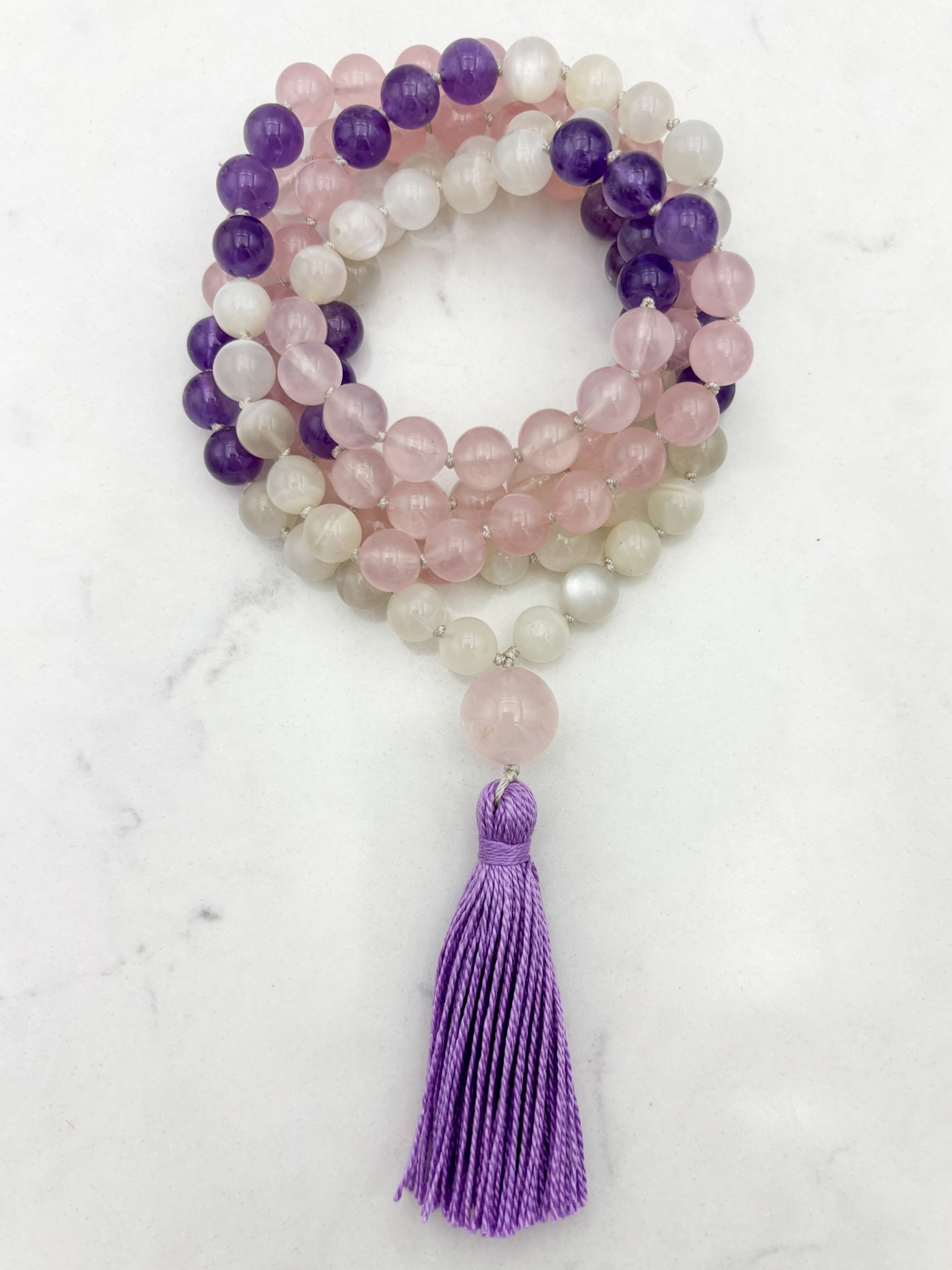wisdom gemstone mala necklace with rose quartz, amethyst and moonstone beads, rose quartz guru bead and lilac tassel | radiant malas | handmade in boulder, colorado