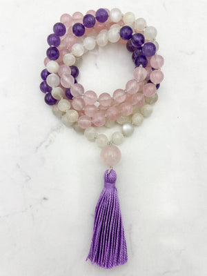 wisdom gemstone mala necklace with rose quartz, amethyst and moonstone beads, rose quartz guru bead and lilac tassel | radiant malas | handmade in boulder, colorado
