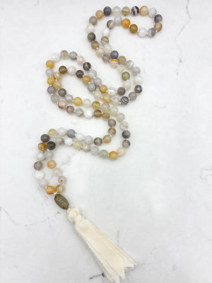 yellow botswana agate gemstone mala with carnelian guru bead and cream silk tassel | radiant malas | handmade in boulder, colorado
