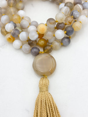 yellow botswana agate gemstone mala with phantom agate guru bead and gold tassel | radiant malas | handmade in boulder, colorado